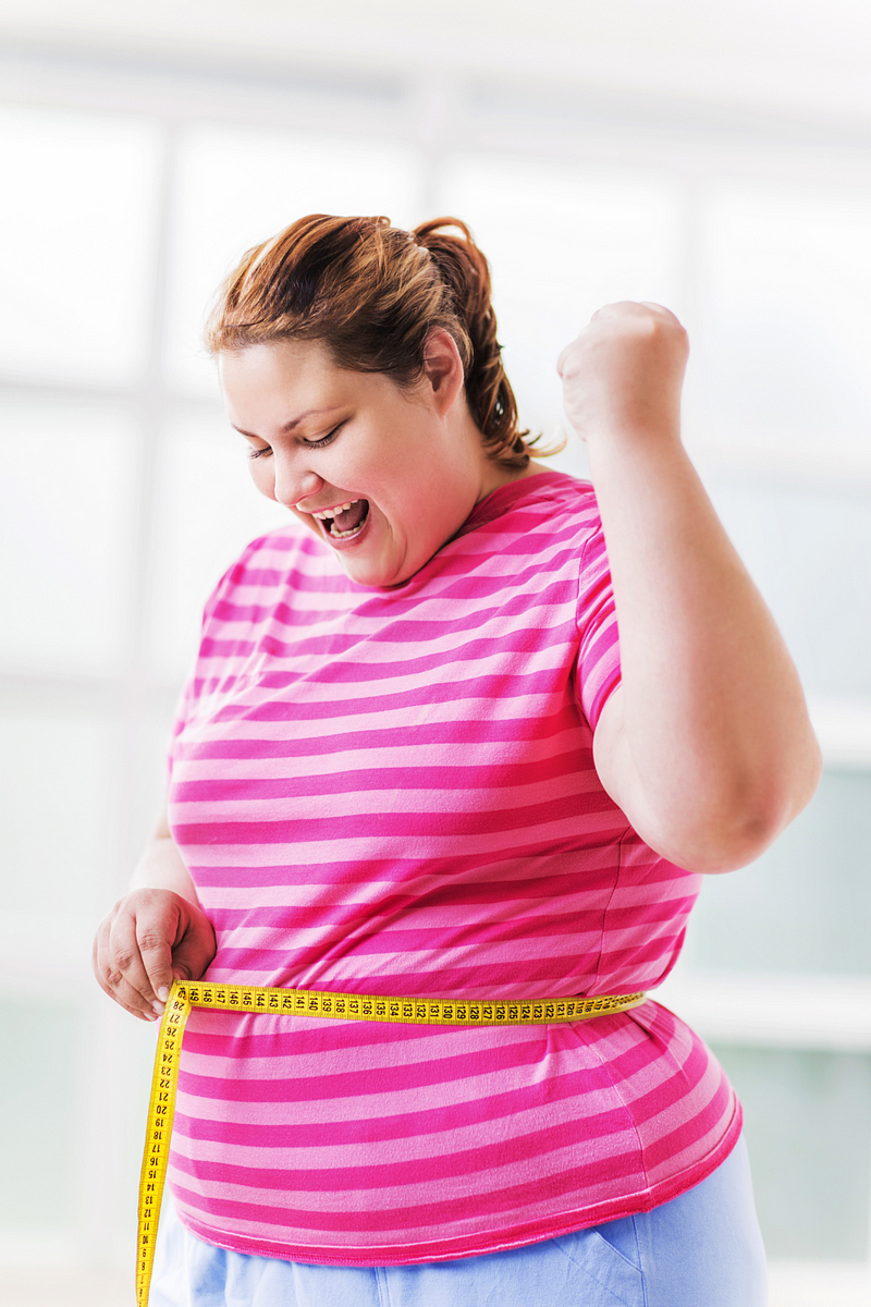 A woman enjoying outdoor activities as part of her fitness journey.