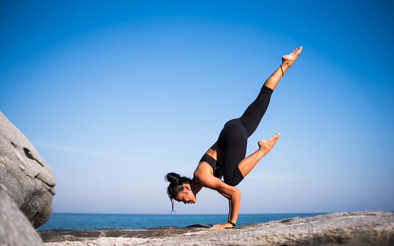 Woman enjoying exercise on the beach