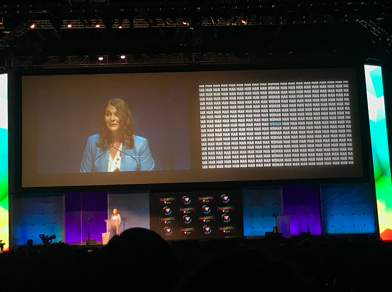 Engaging woman speaking at a tech conference