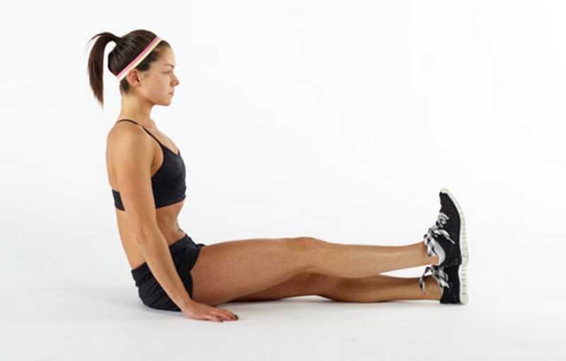 Demonstrating a straight leg raise for hip flexor strength