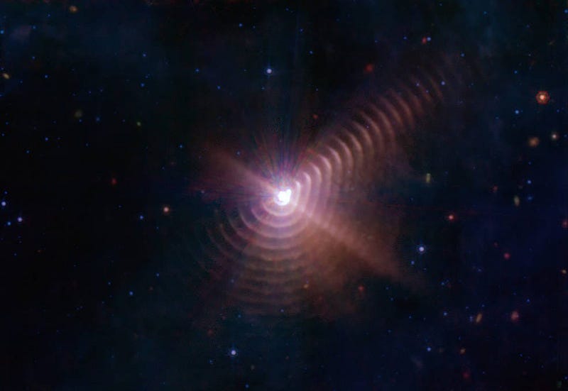 Cosmic rings surrounding Wolf-Rayet star WR-140