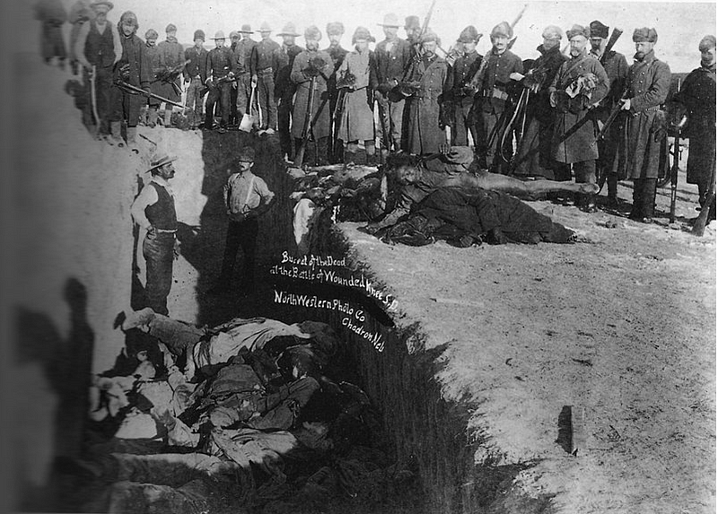 Burial of the dead after the Wounded Knee Massacre.